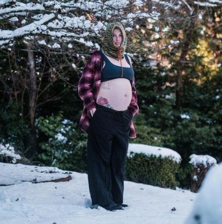 Ireland Baldwin showed off her baby bumps in the snow.